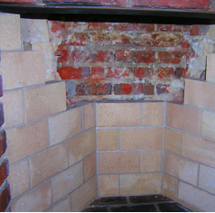 new bricks put in place by chimney sweep in hebron